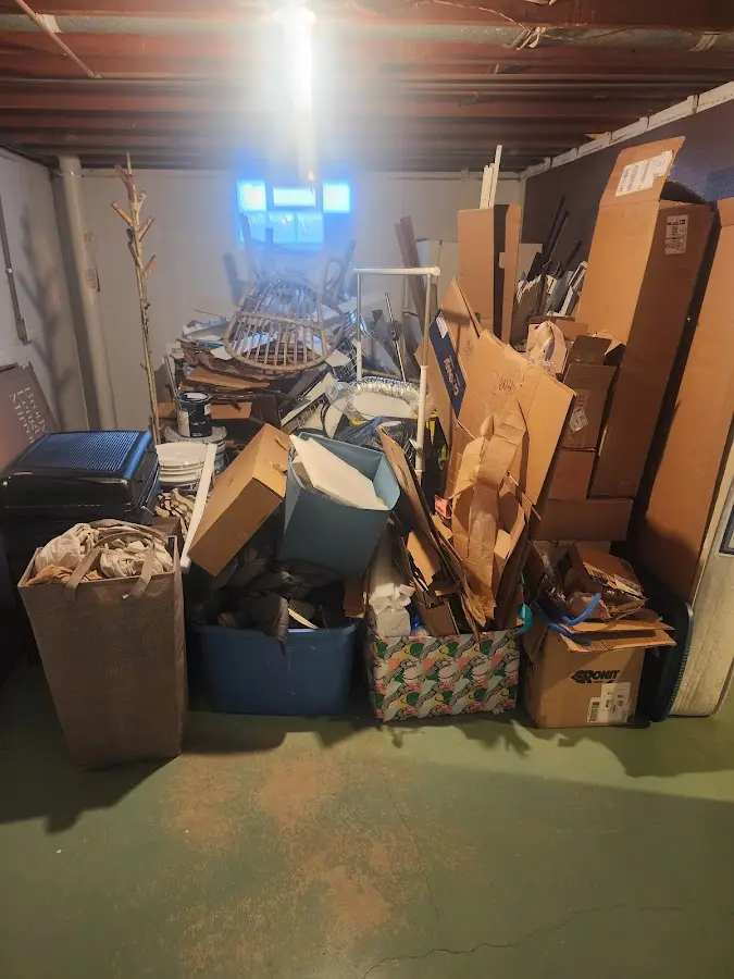 Roll-off dumpster container at job site for Yard Waste Dumpster Rental in Orleans